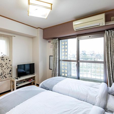 Ryokan Sinsekai - Tourpalace Осака Екстериор снимка