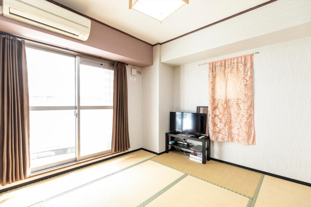 Ryokan Sinsekai - Tourpalace Осака Екстериор снимка