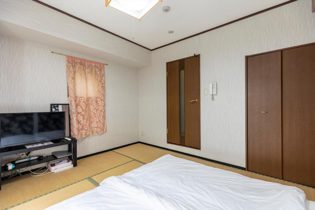 Ryokan Sinsekai - Tourpalace Осака Екстериор снимка