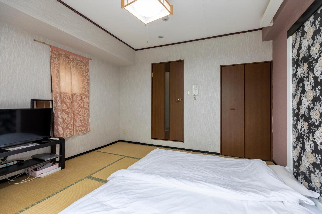 Ryokan Sinsekai - Tourpalace Осака Екстериор снимка